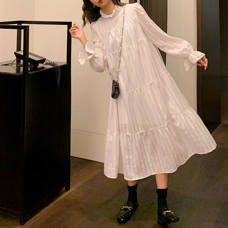 Ruffled Dress With High Neck And Flare Sleeves