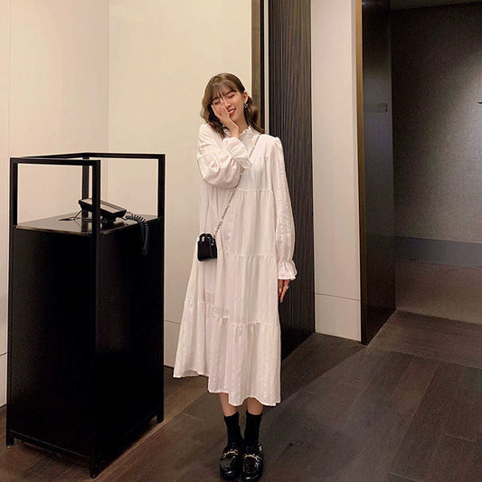 Ruffled Dress With High Neck And Flare Sleeves