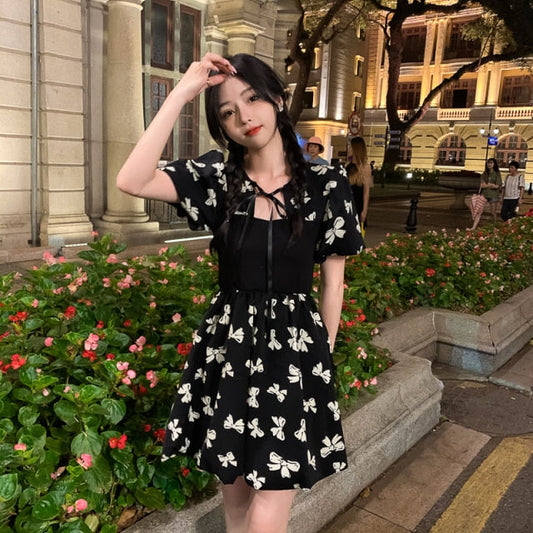 Two-Colored Dress With Bow Print And Ribbon