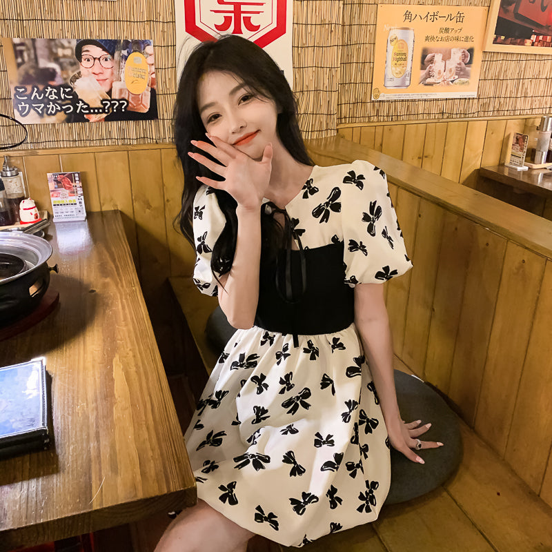 Two-Colored Dress With Bow Print And Ribbon